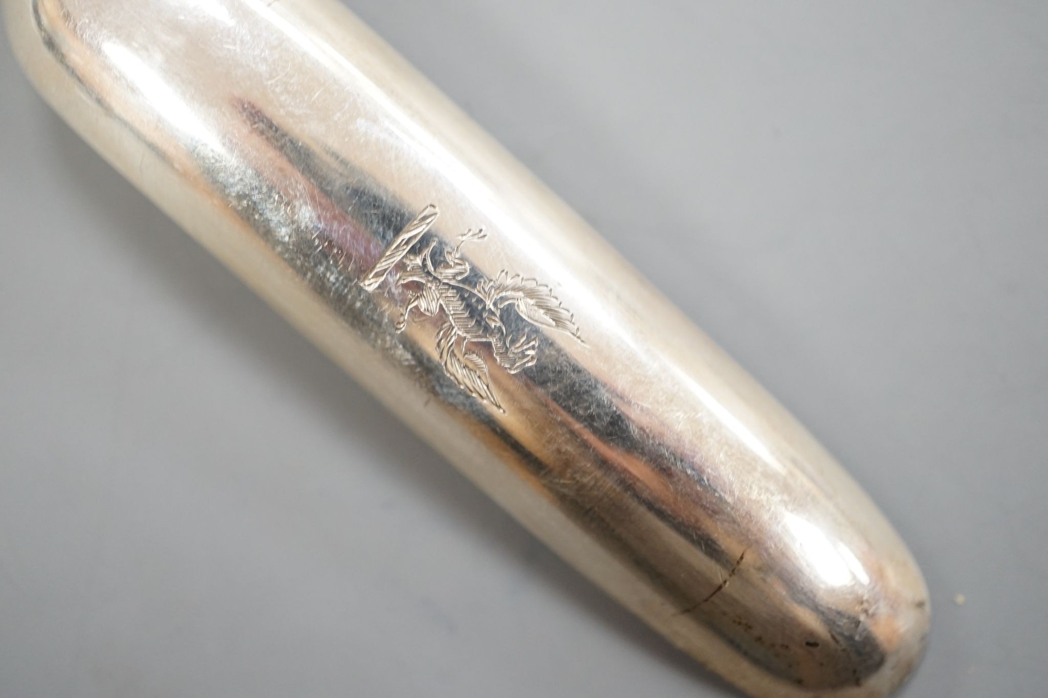 A George III silver marrow scoop, with engraved crest, Peter & William Bateman, London, 1810, 24.6cm, 56 grams.